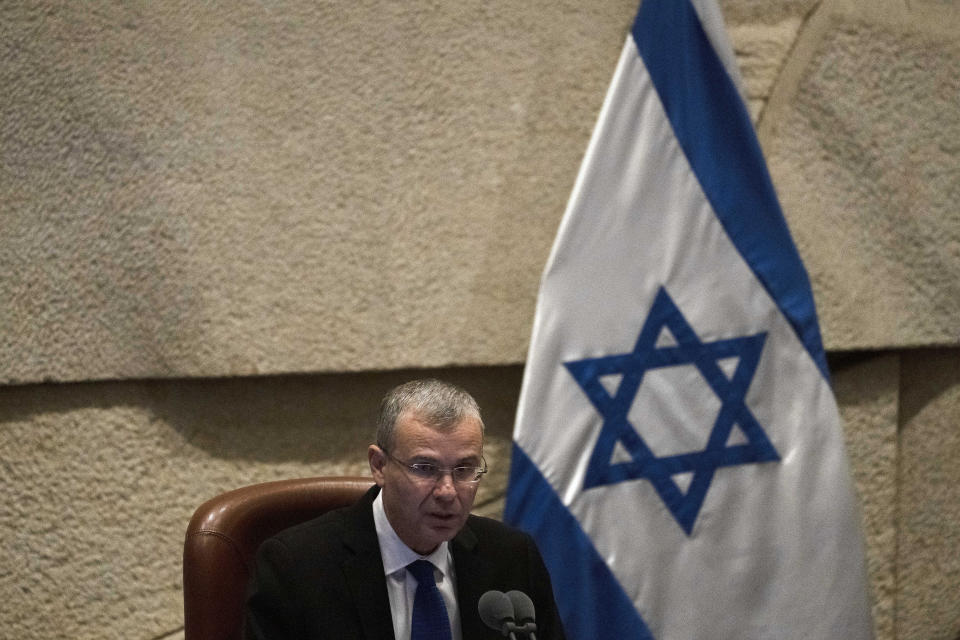 FILE - Yariv Levin, speaks to lawmakers in Israel's parliament, in Jerusalem, Tuesday, Dec. 13, 2022. Israeli Prime Minister Benjamin Netanyahu’s justice minister Levin has unveiled the new government’s long-promised overhaul of the judicial system that aims to weaken the Supreme Court. (AP Photo/ Maya Alleruzzo, File)