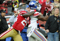 SAN FRANCISCO - NOVEMBER 13: Hakeem Nicks #88 of the New York Giants catches a thirty-two yard touchdown pass over Tarell Brown #25 of the San Francisco 49ers during an NFL football game at Candlestick Park November 13, 2011 in San Francisco, California. The 49ers won the game 27-20. (Photo by Thearon W. Henderson/Getty Images)