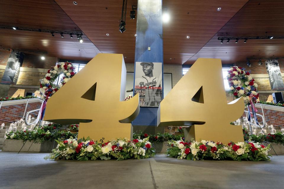 Decorations are shown during "A Celebration of Henry Louis Aaron," a memorial service celebrating the life and enduring legacy of the late Hall of Famer and American icon, on Tuesday, Jan. 26, 2021, at Truist Park in Atlanta. (Kevin D. Liles/Atlanta Braves via AP Pool)