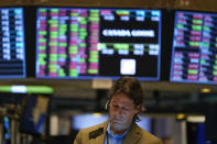 Traders work on the floor at the New York Stock Exchange in New York, Monday, Nov. 28, 2022. (AP Photo/Seth Wenig)