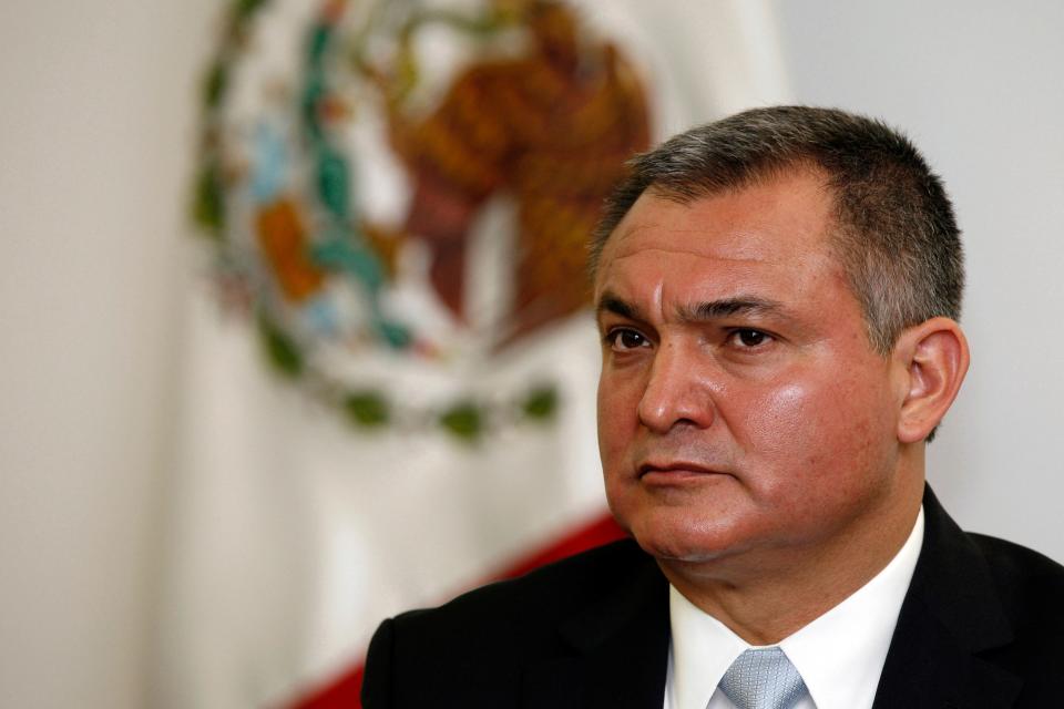 Former Mexican Public Security Secretary Genaro García Luna is the highest-ranking current or former Mexican official ever to be tried in the United States. He is shown in a meeting in Mexico City on Oct. 8, 2010. The former Mexican presidential Cabinet member was convicted in the United States on Tuesday of taking massive bribes to protect the violent drug cartels he was tasked with combating.