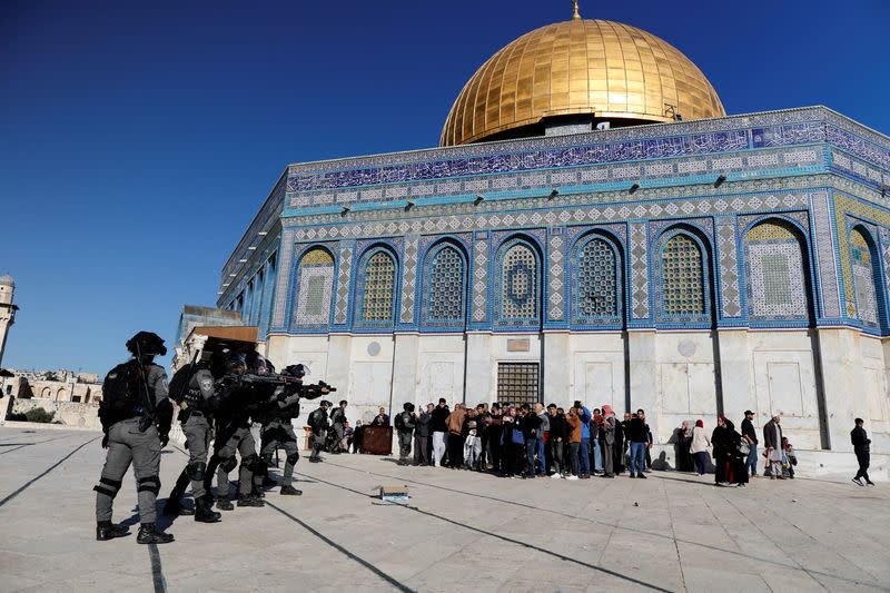 Israeli security forces move in positions during clashes with Palestinian protestors at the compound that houses Al-Aqsa Mosque, known to Muslims as Noble Sanctuary and to Jews as Temple Mount, in Jerusalem's Old City