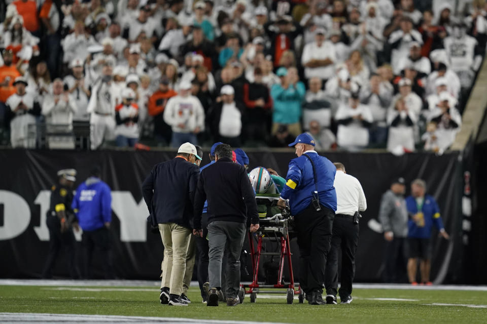 Miami Dolphins quarterback Tua Tagovailoa is taken off the field on a stretcher during the first half of an NFL football game against the Cincinnati Bengals, Thursday, Sept. 29, 2022, in Cincinnati. (AP Photo/Joshua A. Bickel)