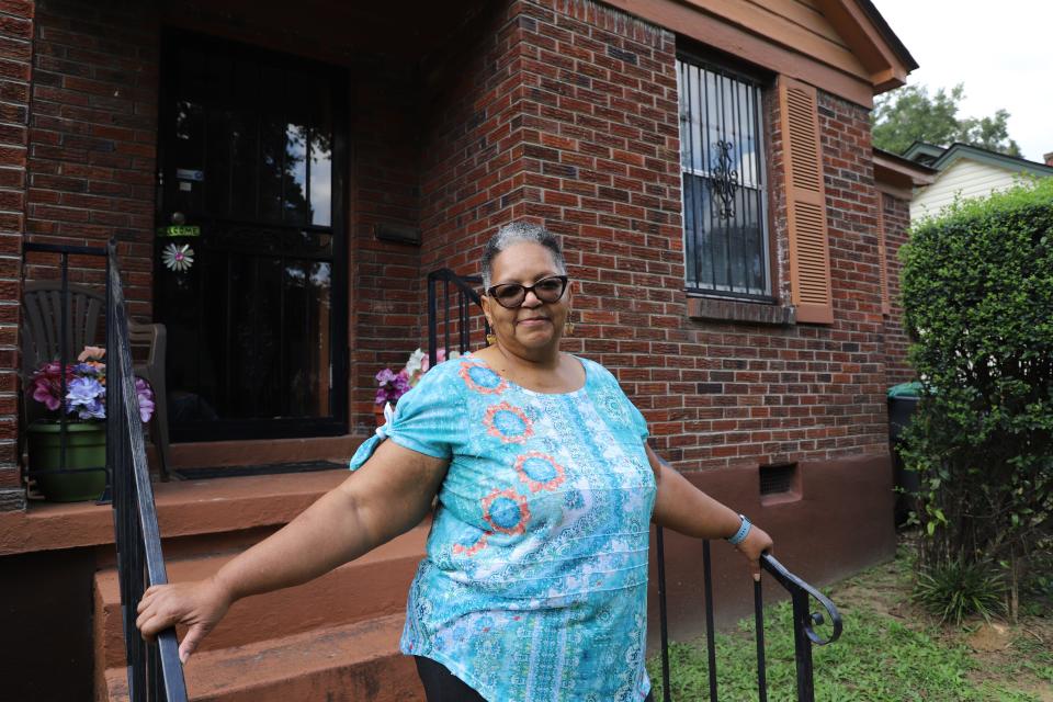 Gwendolyn Mosby stands in front of her repaired home. Her home is one of 1,100 Habitat for Humanity of Greater Memphis has repaired since 2015 via the nonprofit's Aging in Place program.