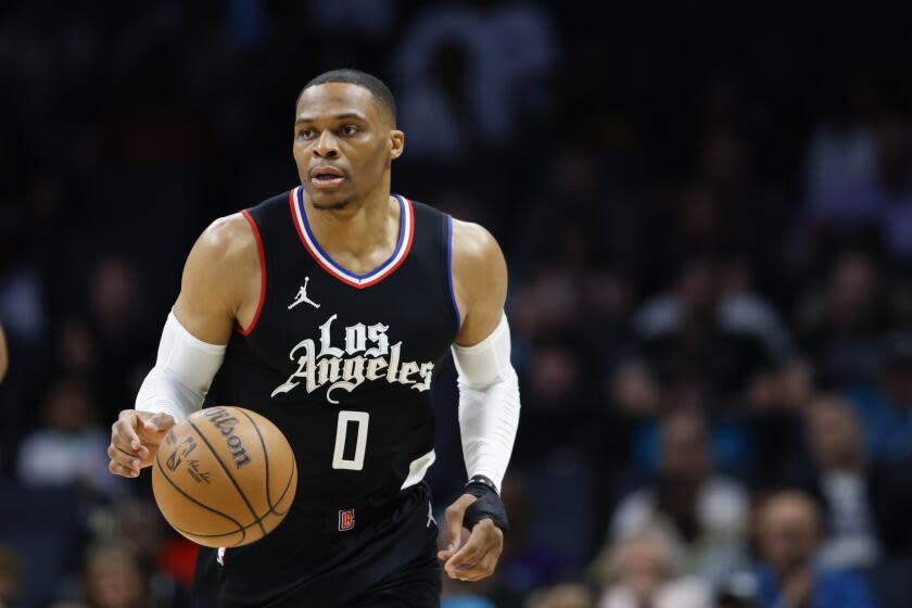 Los Angeles Clippers guard Russell Westbrook brings the ball up court against the Charlotte Hornets