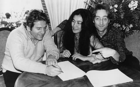 Allen Klein with Yoko Ono and John Lennon in 1977 - Credit: &nbsp;AP