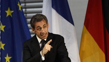 Former French President Nicolas Sarkozy gestures during his speech at an event hosted by the Konrad-Adenauer foundation in Berlin February 28, 2014. REUTERS/Tobias Schwarz