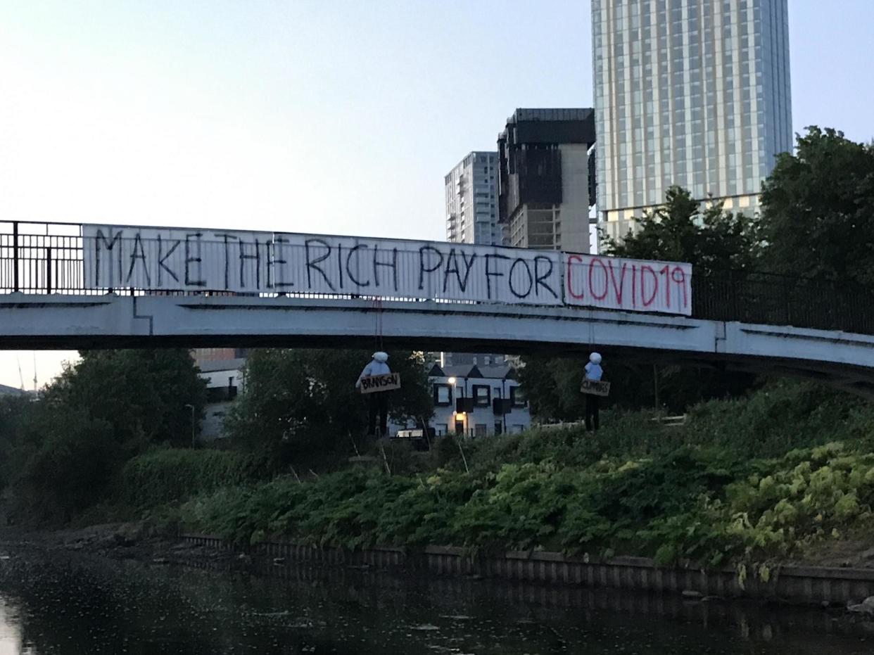 Image shows violent imagery on footbridge in Salford