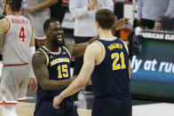 Michigan's Chaundee Brown, left, and Franz Wagner celebrates their win over Ohio State after an NCAA college basketball game Sunday, Feb. 21, 2021, in Columbus, Ohio. (AP Photo/Jay LaPrete)