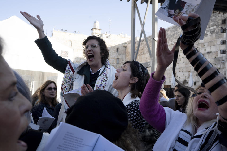 FILE - Members of Women of the Wall sing during Rosh Hodesh prayers marking the new month at the Western Wall, the holiest site where Jews can pray, in the Old City of Jerusalem, Wednesday, Feb. 22, 2023. The group has waged a decades-long campaign for gender equality at the holy site. (AP Photo/Maya Alleruzzo, File)