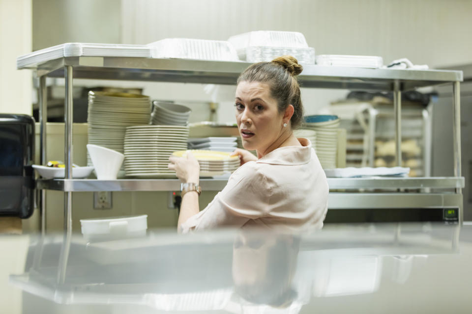 upset waitress in the kitchen