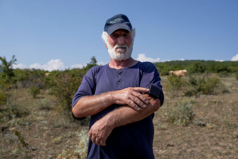 The Wider Image: Bordering Georgia's breakaway regions, villagers fear Russia's next steps