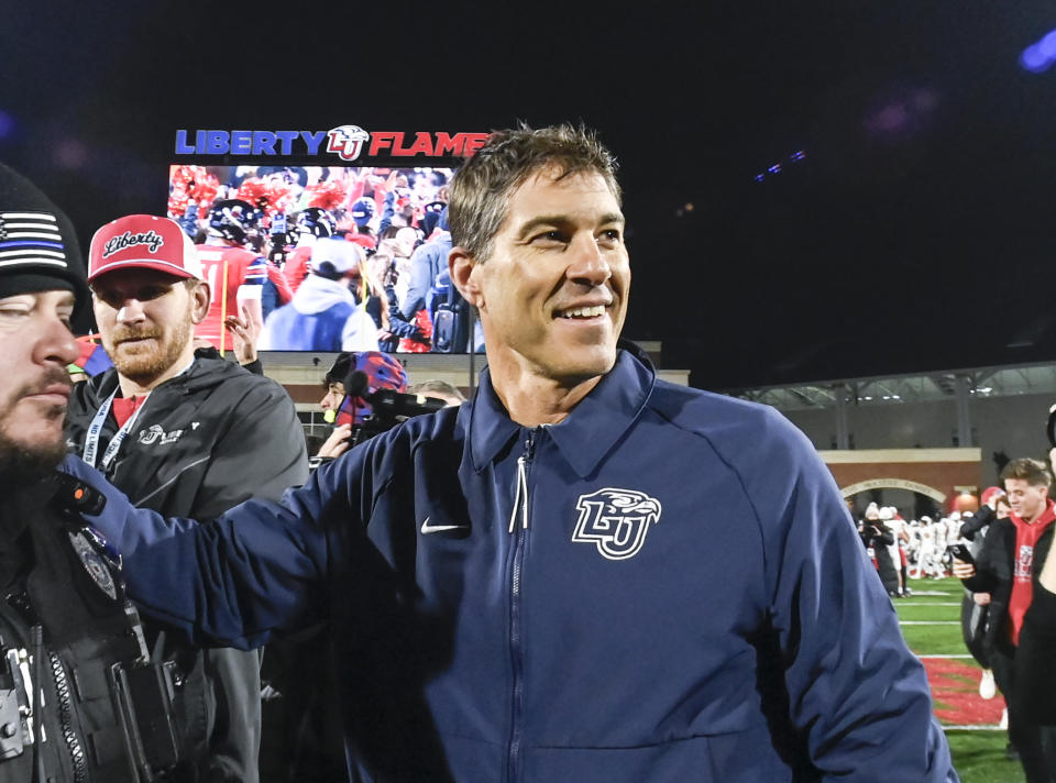 Liberty coach Jamey Chadwell celebrates the team's win over New Mexico State during the Conference USA championship NCAA college football game Friday, Dec. 1, 2023, in Lynchburg, Va. (Paige Dingler/The News & Advance via AP)
