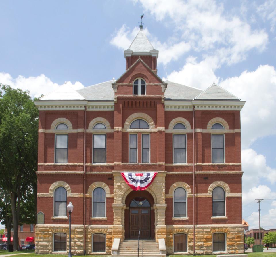 Crowds gather on the lawn of the historic courthouse for concerts and community gatherings.