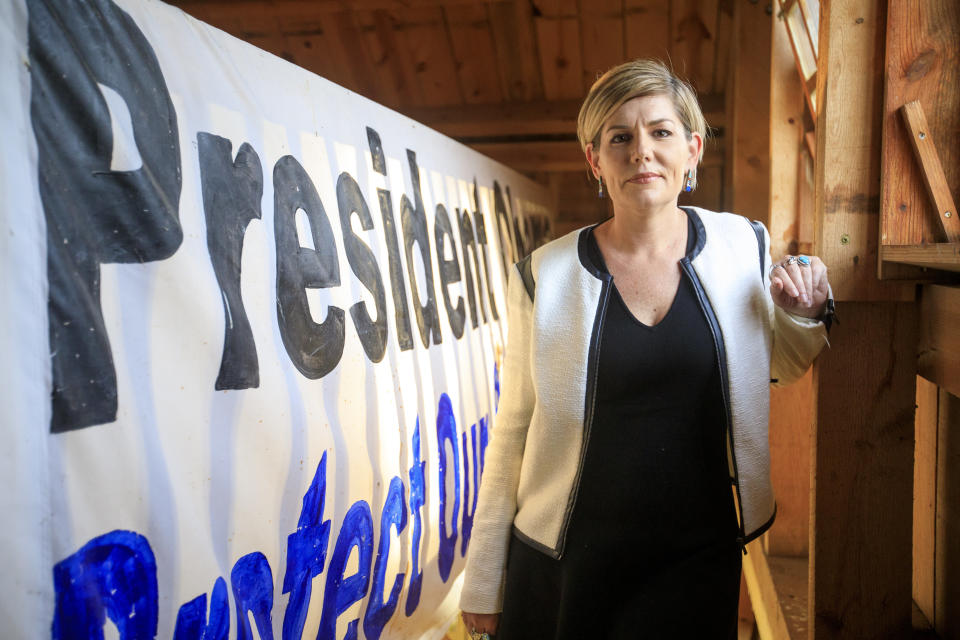 Jane Kleeb, chair of the Nebraska Democratic Party and activist against the Keystone XL pipeline, poses on Sept. 19 at a solar barn she helped build. The barn sits along the proposed path of the Keystone XL pipeline in Bradshaw, Nebraska. 