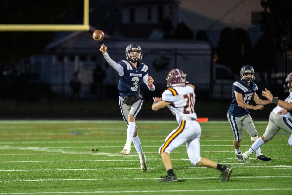 Rutherford senior quarterback Van Weber throws a pass before being hit in a football game against Park Ridge in 2021.