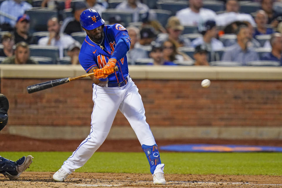 New York Mets' Starling Marte hits a double during the third inning of a baseball game against the New York Yankees Tuesday, July 26, 2022, in New York. (AP Photo/Frank Franklin II)