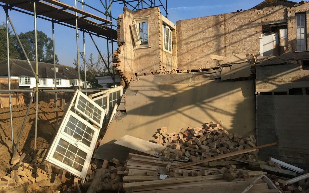 A wealthy family made a lucky escape after their luxury home collapsed in the middle of the night, leaving just a pile of rubble - Police/SWNS.COM