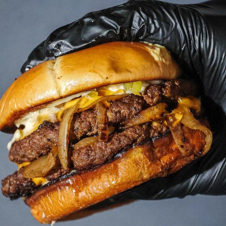 The new restaurant's burgers are made with fresh ingredients, stacked on a potato bun and served with fries, which are hand cut and double fried.