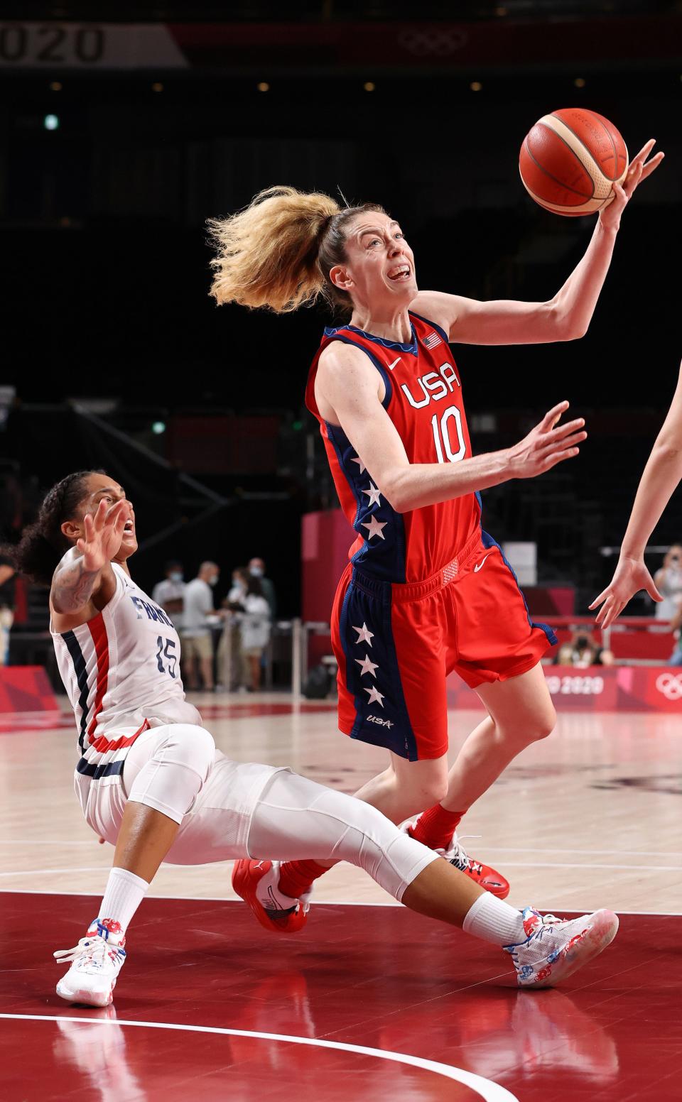 Breanna Stewart fights for possession against France's Gabby Williams.