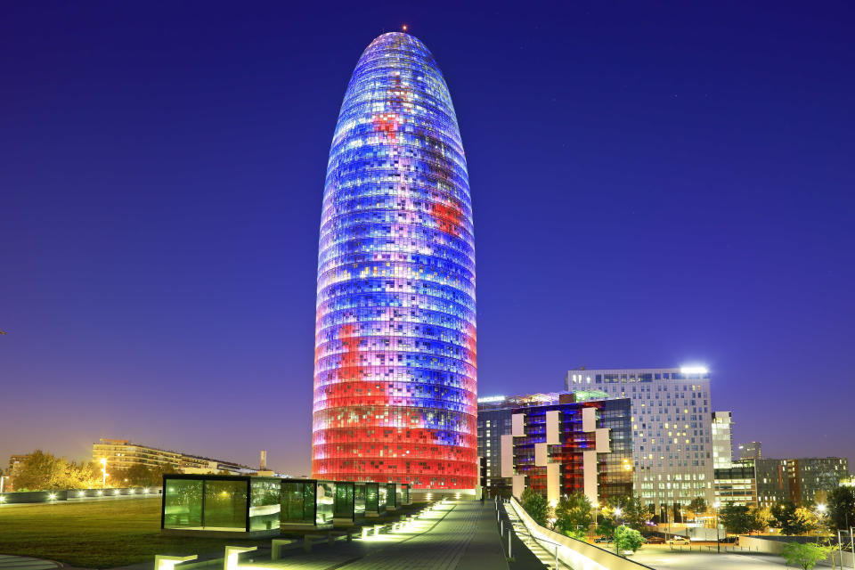 <a href="http://www.aviewoncities.com/barcelona/torreagbar.htm" target="_blank">Torre Agbar</a>, the 466-foot-high home of Aguas de Barcelona in Spain, was designed by French architect Jean Nouvel. No, he didn't call the style "Modern Illuminated Dildo." 