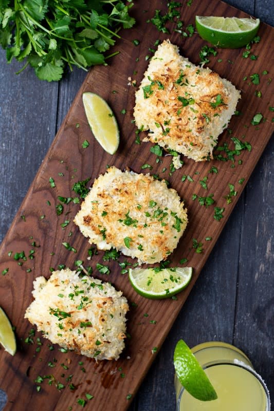 Kitchen Swagger<p>Crispy baked coconut cod breaded with shredded coconut and panko crumbs.</p><p><strong>Get the recipe: <a href="https://kitchenswagger.com/coconut-crusted-cod-recipe/" rel="sponsored" target="_blank" data-ylk="slk:Coconut Crusted Cod;elm:context_link;itc:0;sec:content-canvas" class="link "><em>Coconut Crusted Cod</em></a></strong></p>