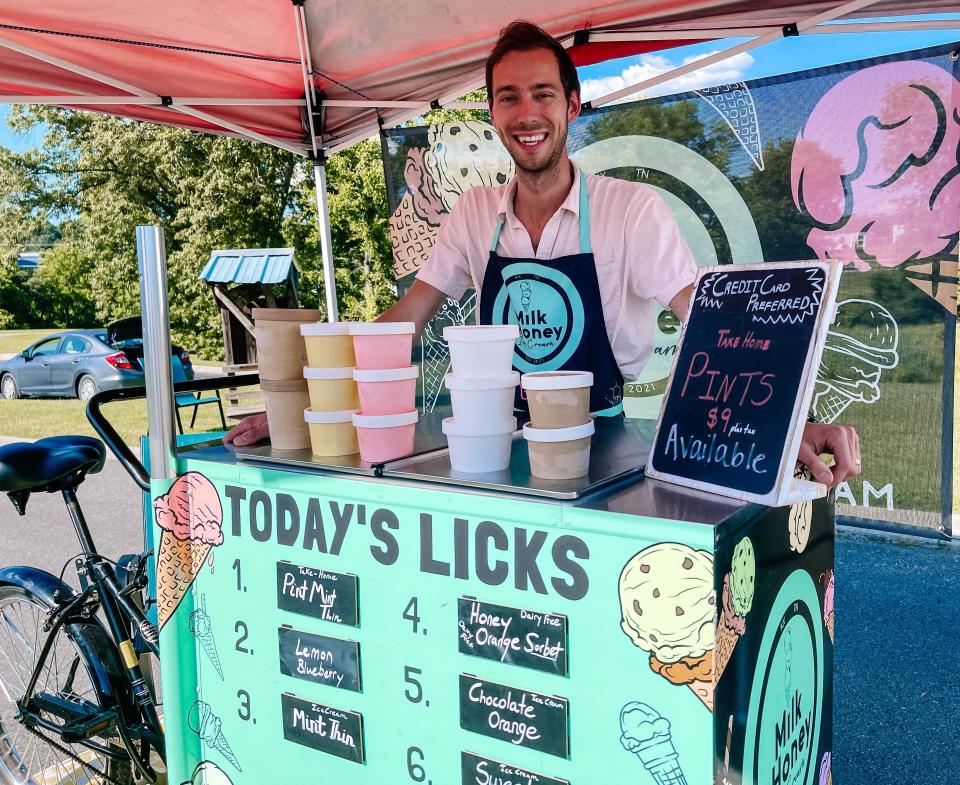 Trent Sanders sells his Milk + Honey Ice Cream from a pushcart at Ebenezer Farmers Market on May 31.