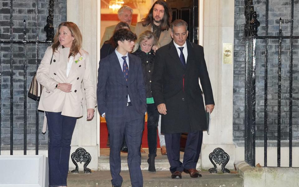 The relatives of Barnaby Webber, Grace O'Malley Kumar and Ian Coates leave 10 Downing Street, London