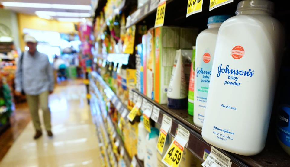 Johnson's baby powder sits on a supermarket shelf in August 2017, when the company was ordered to pay $417 million to a woman who claimed she developed terminal ovarian cancer after using the company's talc-based products. The case was one of many lawsuits brought nationwide alleging the company failed to warn consumers of the risk of cancer from talc in its products. (Photo: AFP Contributor via Getty Images)