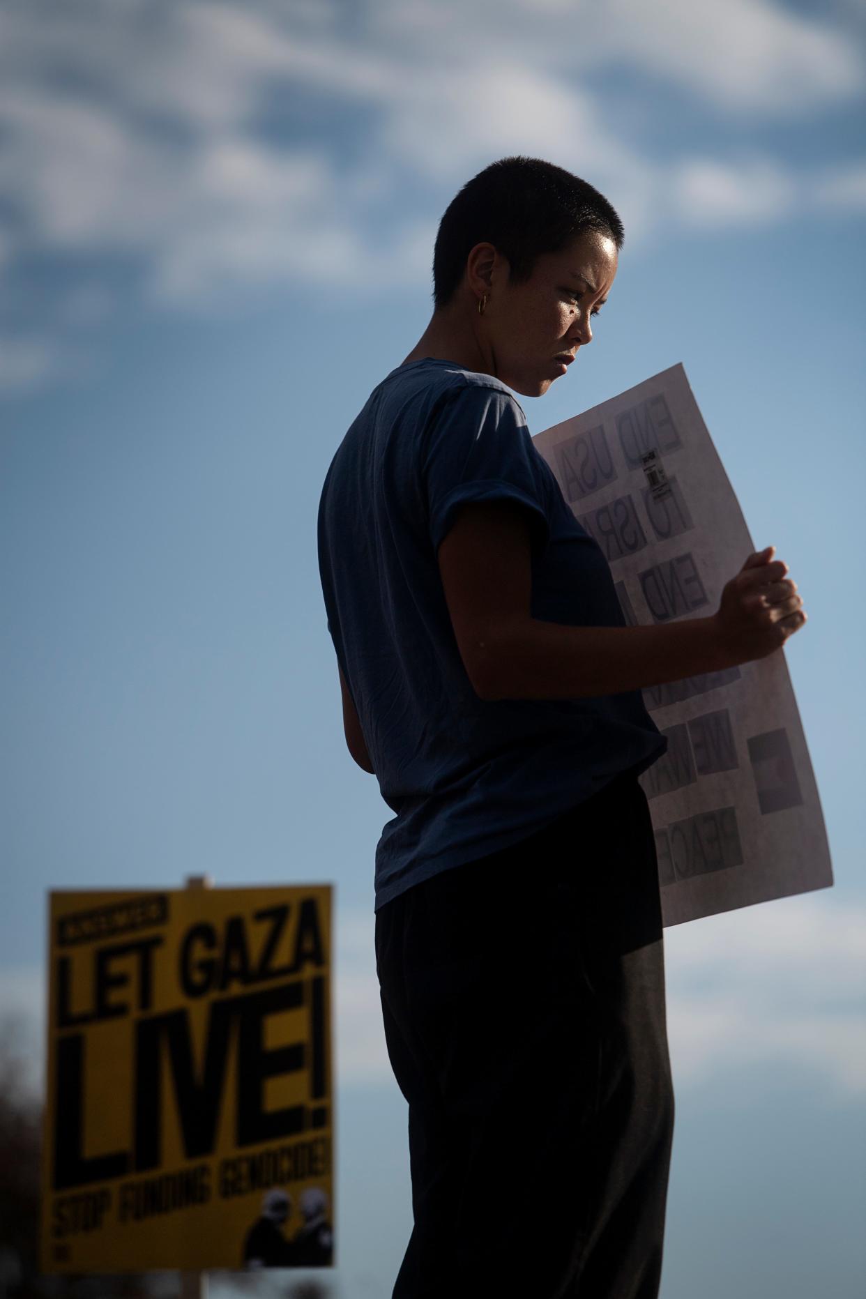 Protesters hold signs in Pack Square while demanding a cease-fire in Palestine on November 9, 2023, in Asheville.