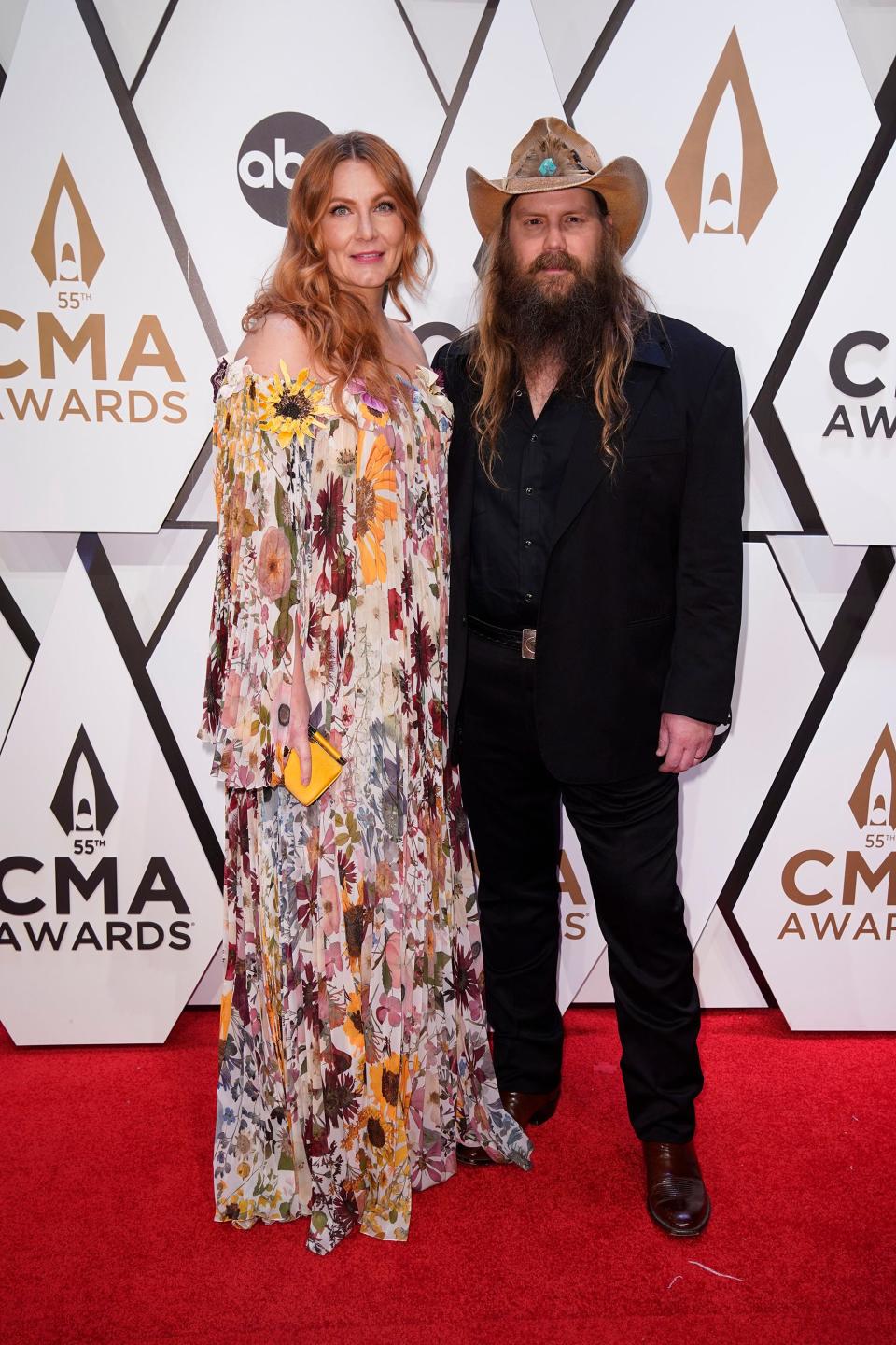 Chris and Morgane Stapleton arrive for the 55th CMA Awards at Bridgestone Arena Wednesday, Nov. 10, 2021 in Nashville, Tenn.