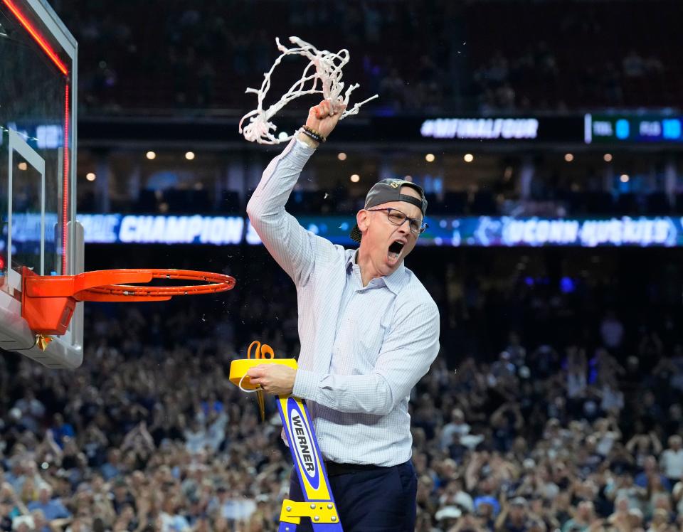 Connecticut  coach Dan Hurley cuts down the net after defeating San Diego State in the national championship game of the 2023 NCAA men's tournament at NRG Stadium.