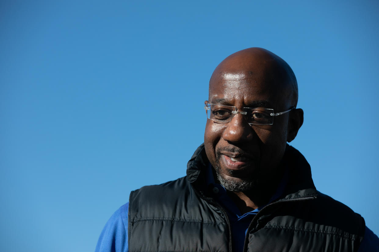 Raphael Warnock during an outdoor drive-in rally. (Photo by Jessica McGowan/Getty Images)                                                                  