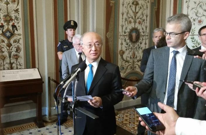 International Atomic Energy Agency director general Yukiya Amano addresses reporters on August 5, 2015 on Capitol Hill after briefing Senate Foreign Relations Committee members about inspection regimes related to the Iran nuclear accord (AFP Photo/Michael Mathes)