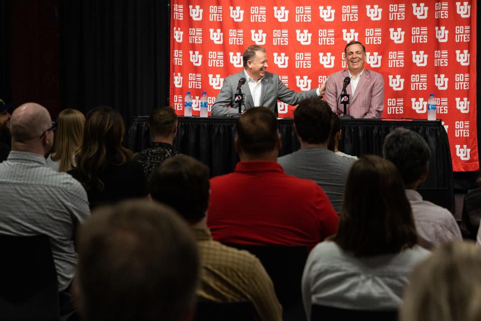University of Utah President Taylor Randall, left, and athletic director Mark Harlan speak at a press conference regarding Utah’s move to the Big 12 Conference.