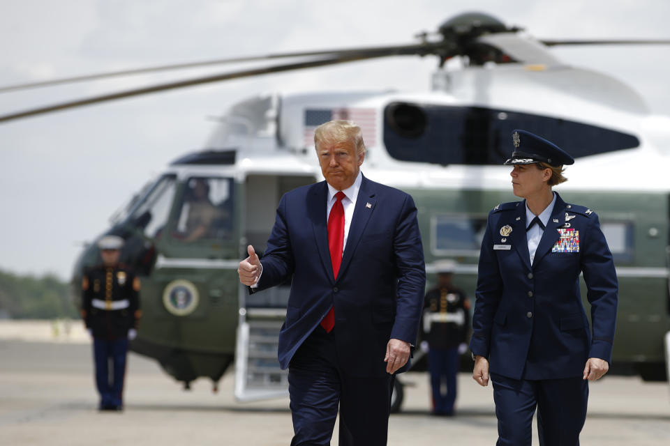 President Donald Trump gestures as he boards Air Force One at Andrews Air Force Base, Md., Friday, June 5, 2020, en route to Maine to attend a roundtable discussion with commercial fishermen and tour a medical swab manufacturing facility. (AP Photo/Patrick Semansky)