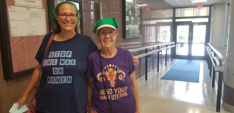 Jen Cordova, 42, and her friend Denzil Sol, 88, attended the meeting on Tuesday in opposition to the proclamation made by county commissioners.