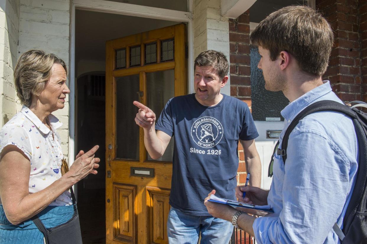 Hard pounding: Tory councillor Angela Graham and James Jeffreys chat to Earlsfield resident Henry Pugh: Lucy Young