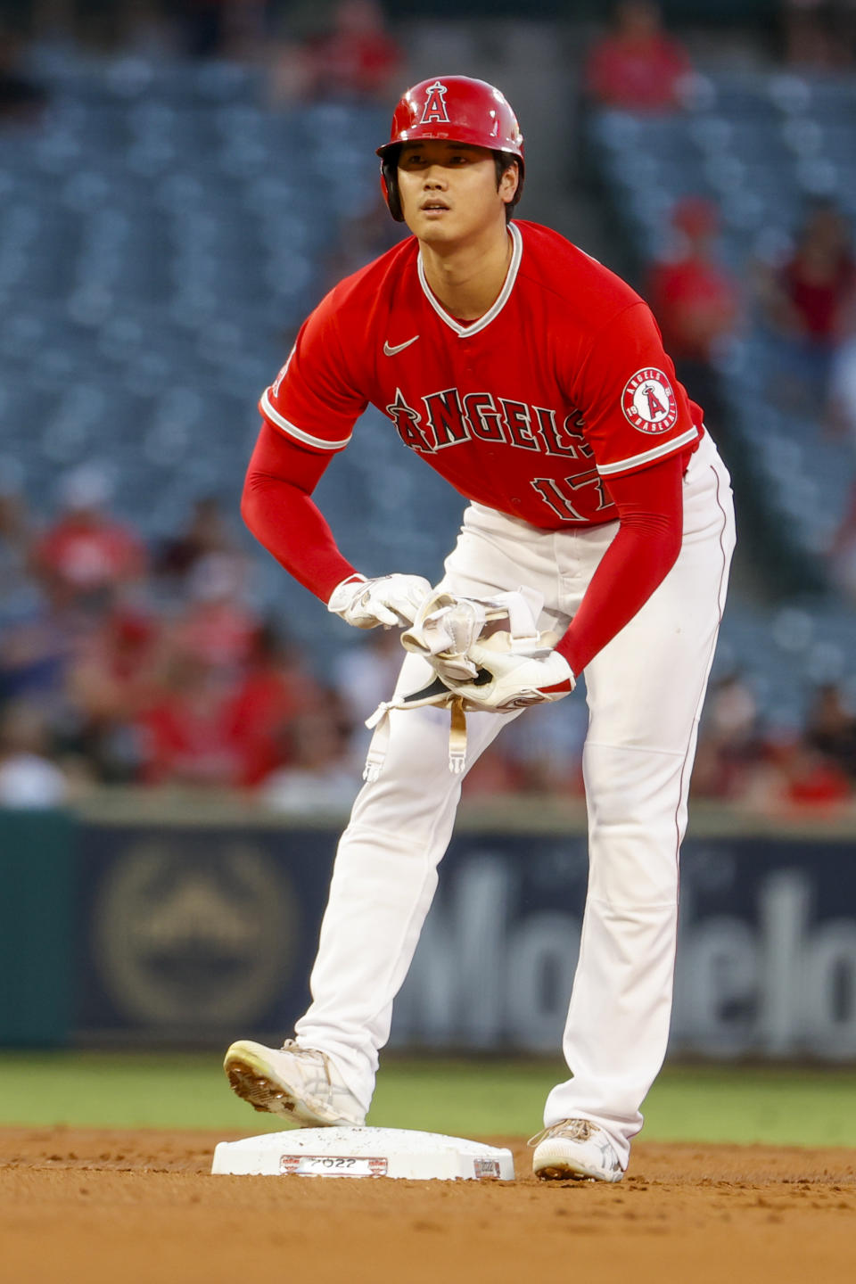 Los Angeles Angels' Shohei Ohtani stands at third base during the first inning of a baseball game against the Detroit Tigers in Anaheim, Calif., Monday, Sept. 5, 2022. (AP Photo/Ringo H.W. Chiu)