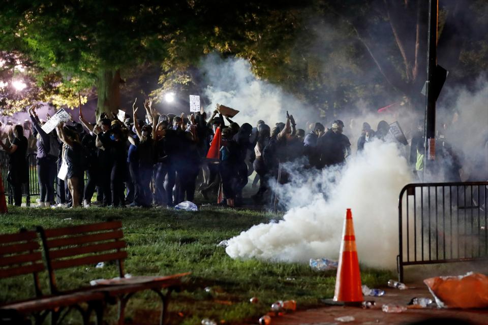 Tear gas billows as demonstrators gather in Lafayette Park to protest the death of George Floyd, Sunday, May 31, 2020, near the White House in Washington. (ASSOCIATED PRESS /Alex Brandon)