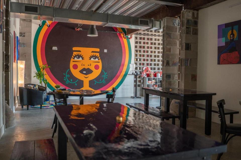 A mural of Vine Street Brewing logo “Maris the beer goddess,” designed by Whiskey Design and painted by artist Warren Harvey, is on display in “the groove room” downstairs.