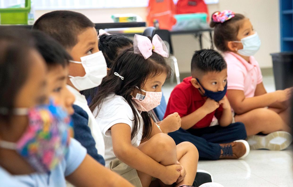 Masked up students at Belvedere Elementary School in West Palm Beach Tuesday, Aug. 10, 2021, the first day of the school year.