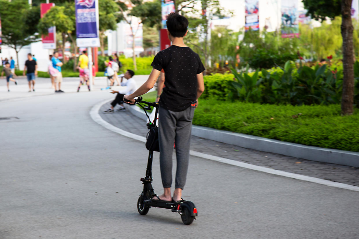 An e-scooter rider seen outside Kallang Wave Mall. (Yahoo News Singapore file photo)