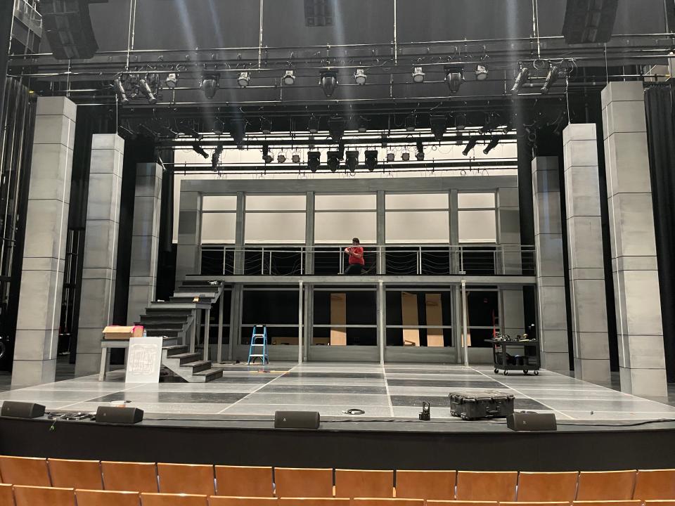 A view of an unfinished "Godspell" set being constructed on the Great Lakes Center for the Arts stage.