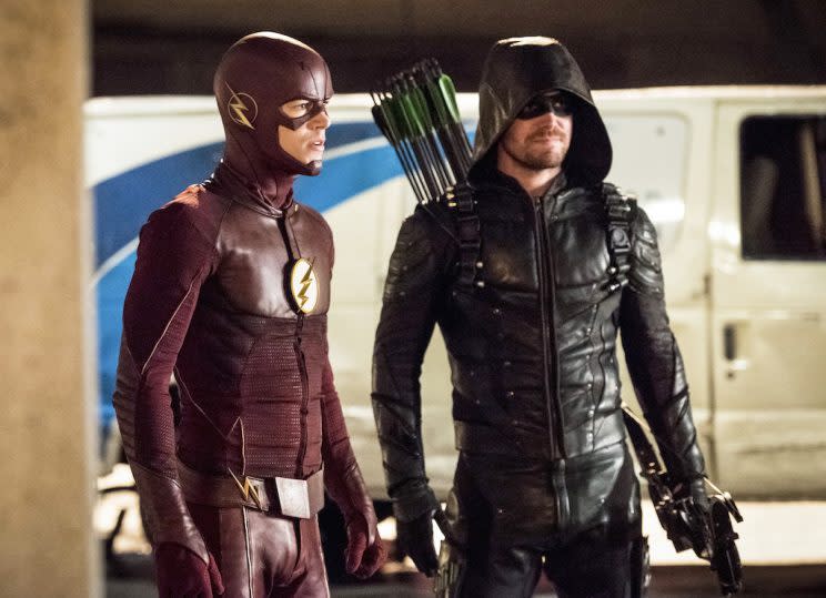 Grant Gustin as The Flash and Stephen Amell as Green Arrow (Credit: The CW)