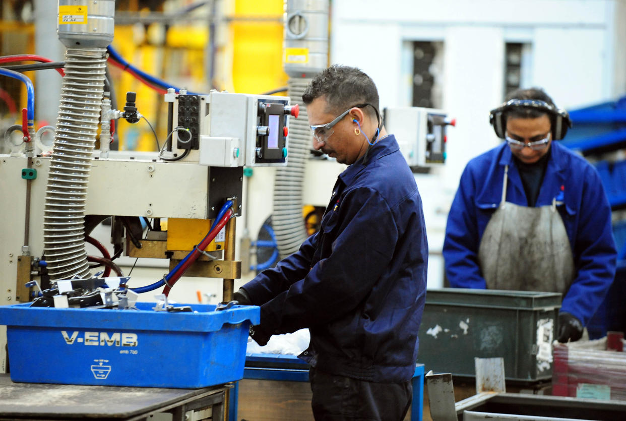 File photo dated 06/01/14 of workers at a manufacturing company. Britain's manufacturers have suffered a "collapse" in demand because of the impact of the global lockdown amid warnings that conditions are unlikely to return to anywhere near normal for some time, a new survey suggests.