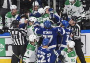 Dallas Stars and Tampa Bay Lightning players rough it up during first-period NHL Stanley Cup finals hockey action in Edmonton, Alberta, Saturday, Sept. 19, 2020. (Jason Franson/The Canadian Press via AP)