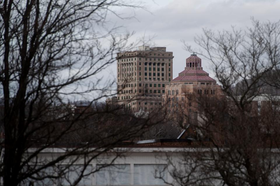The Buncombe County Courthouse, left, and Asheville City Hall are seen from the South Slope, February 11, 2024.