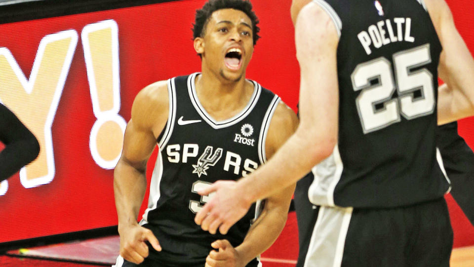 Keldon Johnson and Jakob Poeltl, pictured here in action for the San Antonio Spurs.