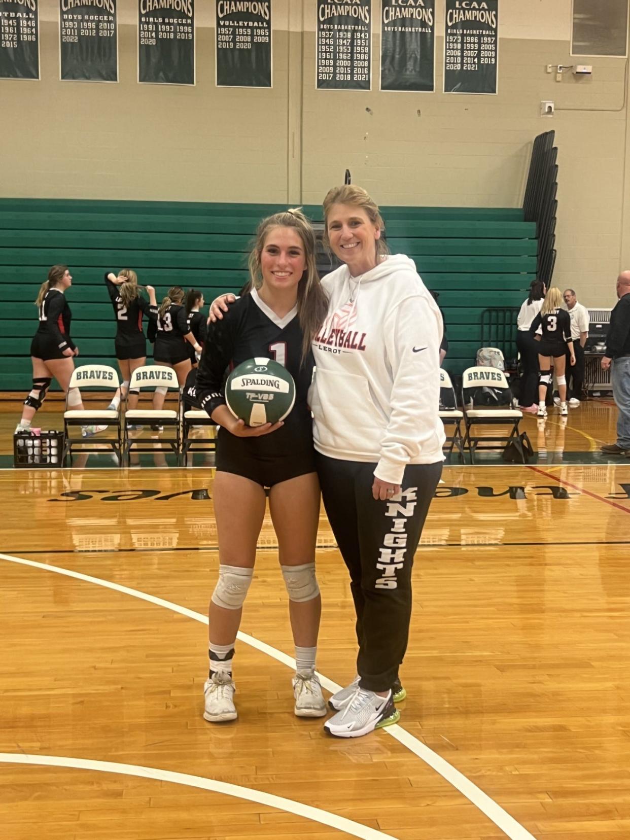 LeRoy senior captain Dana Reschke and coach Susan Staba after a senior night straight sets win over Geneseo on Wednesday. Reschke dished out 22 assists to surpass 1,000 career assists.
